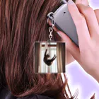 takeoutのカーテンにつかまっているネコ Acrylic Key Chain