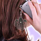 『Nothing Is Real』-- IN SUZURIの動物家紋。H.T.（桐とゾウ）黒 Acrylic Key Chain