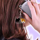 猫ねこママどんぐりのゆきころふりむき Acrylic Key Chain