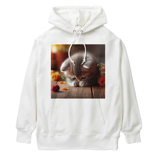 花瓶を倒して意気消沈のこにゃんこ Heavyweight Hoodie