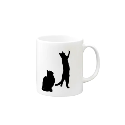 何かを見つめる黒猫たち Mug